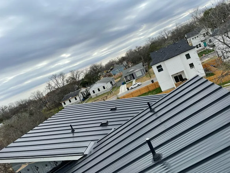 Standing seam metal roof panels with vents for Skylight Repair in Columbia Falls